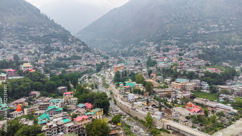 Aerial view of himalayan mountains at kasol himachal pradesh. Small villages and colorful local houses nested in the hills of parvati valley at kasol, himachal pradesh, India. photo