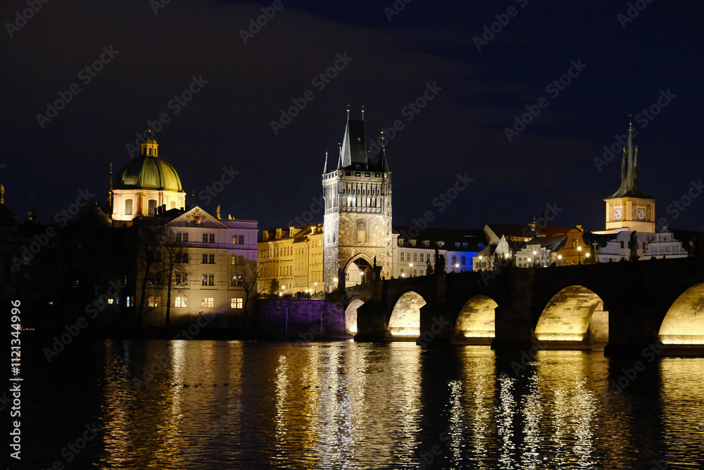 Vltava river and Charles bridge in Prague at night Vltava river and Charles bridge in Prague at night