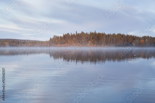 Autumnal lake scenery in Sweden during sunset