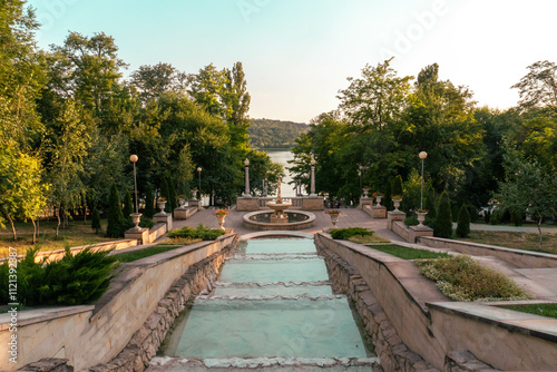 A fountain with water streams gently cascading down photo