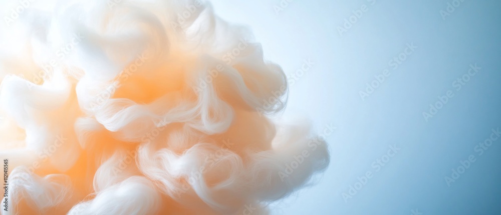 Soft, swirling clouds of orange and white against a blue background. Soft, swirling clouds of orange and white against a blue background.