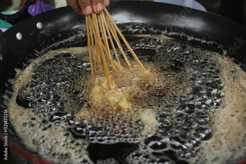 fried eggs in a frying pan photo