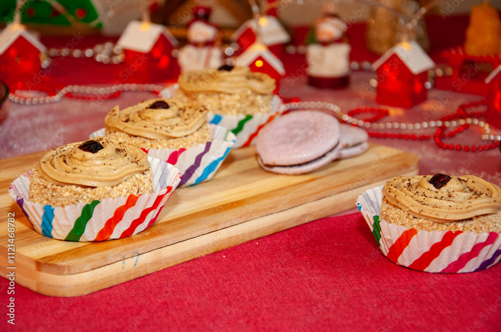 Fototapeta premium Sweet yummy dessert. Wedding cake buffet. Buttercream homemade cupcake. Birthday cupcake muffin. Tasty cup cake with cream. Homemade muffin bakery. Handmade food. Cupcake food. Mini dessert