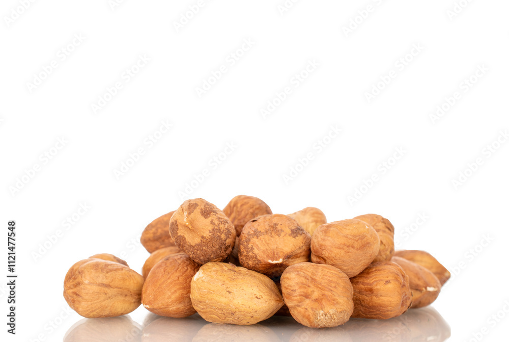 Several hazelnuts, close-up, isolated on white background. Several hazelnuts, close-up, isolated on white background.