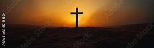 Silhouette of a Christian Cross Against a Dramatic Glowing Sky