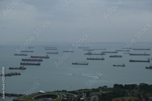 Boats in the Singapore Sea photo