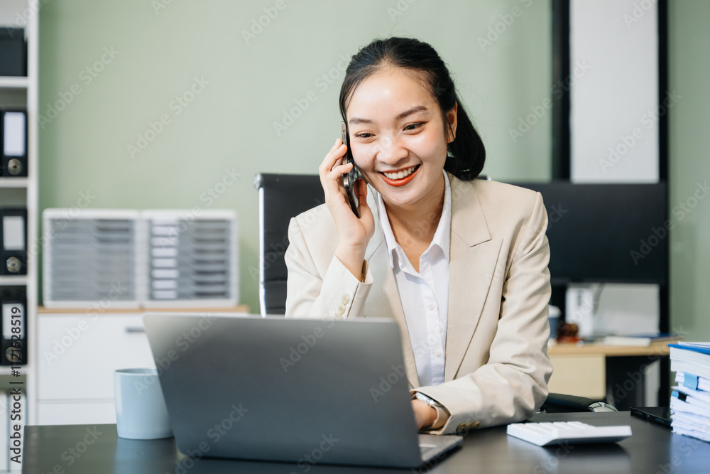 Businesswoman working in the office with working notepad, tablet and laptop documents Businesswoman working in the office with working notepad, tablet and laptop documents