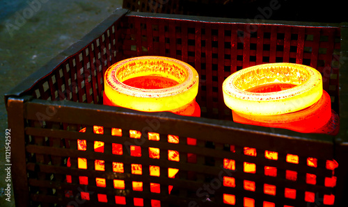 red hot forged product, forging metal piece shaping drop hammer to give it a tool shape. forging hit by hammer on a tool mould cast to form an automatic machine component part isothermal weld factory	