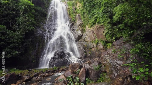 Sunanta Waterfall  in the lush forest park photo