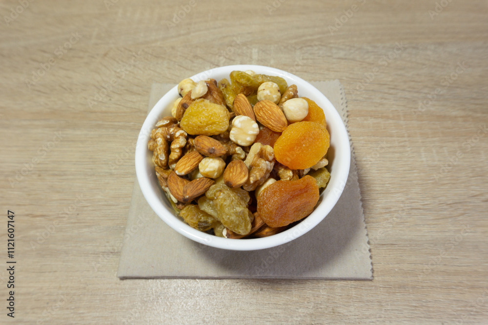 Dried nuts mix. Almond and hazelnut, peanut walnut and seed, coconut. Dry healthy snack. Protein food ingridient. Dried nuts mix. Almond and hazelnut, peanut walnut and seed, coconut. Dry healthy snack. Protein food ingridient.