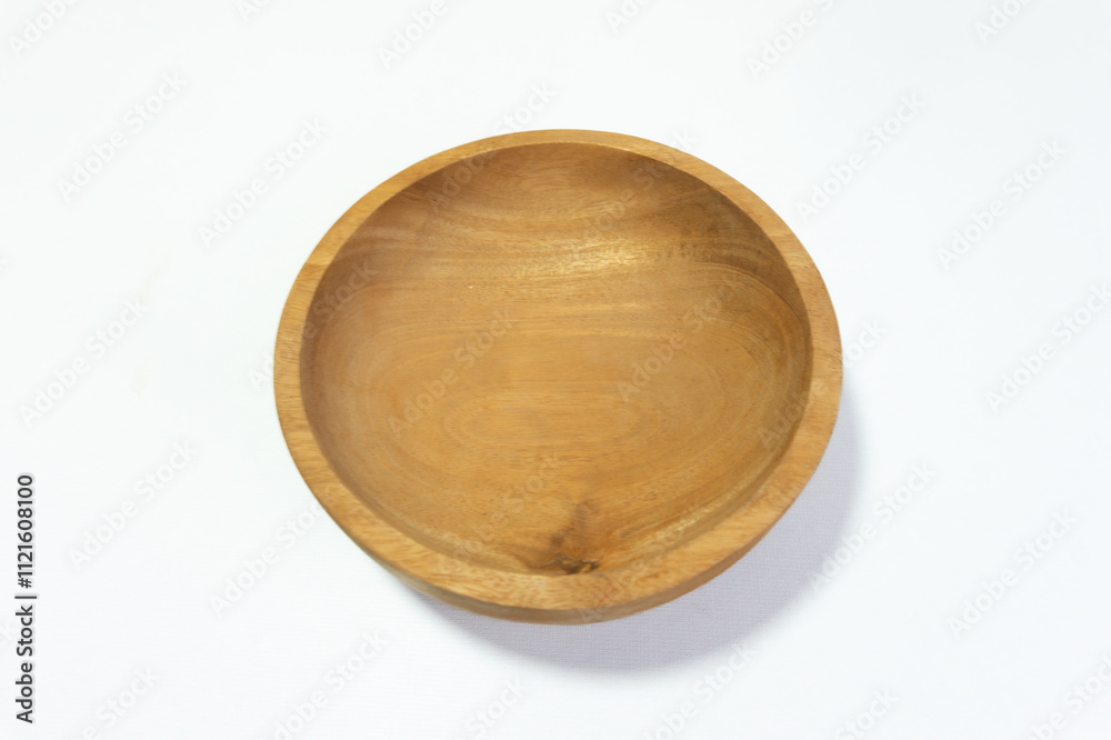 Wooden bowl isolated on white background with a 45 degree angle setup Wooden bowl isolated on white background with a 45 degree angle setup