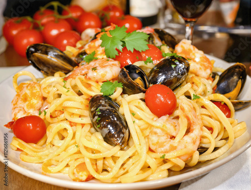 Delicious Seafood Pasta Dish Featuring Mussels and Shrimp with Cherry Tomatoes