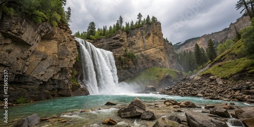 A stunning waterfall cascading down a rocky cliff, landscape, erosion, nature