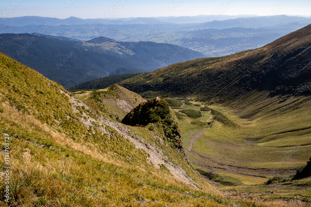 the slope of the mountain range is carved with traces of winter avalanches the slope of the mountain range is carved with traces of winter avalanches