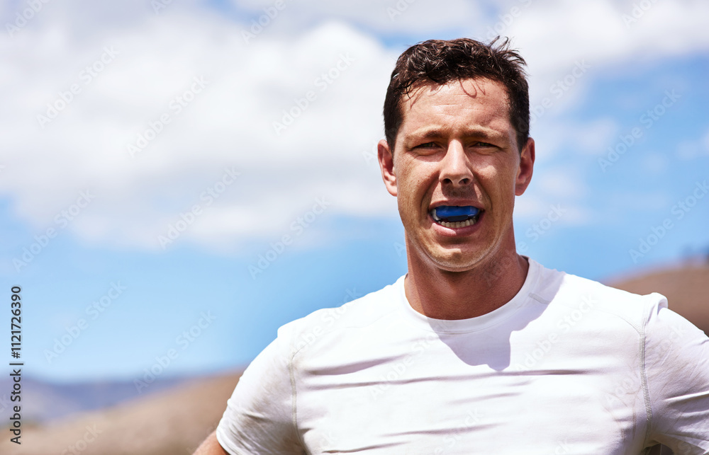 Sport player, rugby and man in portrait on field for competition practice, tournament training and exercise. Fitness, male person and mouthguard on stadium for protection, safety and match workout Sport player, rugby and man in portrait on field for competition practice, tournament training and exercise. Fitness, male person and mouthguard on stadium for protection, safety and match workout