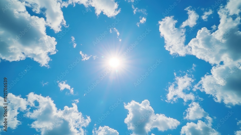 Bright summer sky with fluffy clouds and sunburst captured in Pennsylvania during August 2019. Ideal for nature and weather-themed projects.