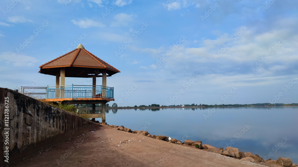 Serene lakeside gazebo and beautiful natural in Nam Houm lake, at Vientiane capital, Laos, Asia Serene lakeside gazebo and beautiful natural in Nam Houm lake, at Vientiane capital, Laos, Asia