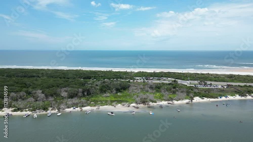 Rising above the coastline near Matanzas Inlet in St Johns County, Florida photo