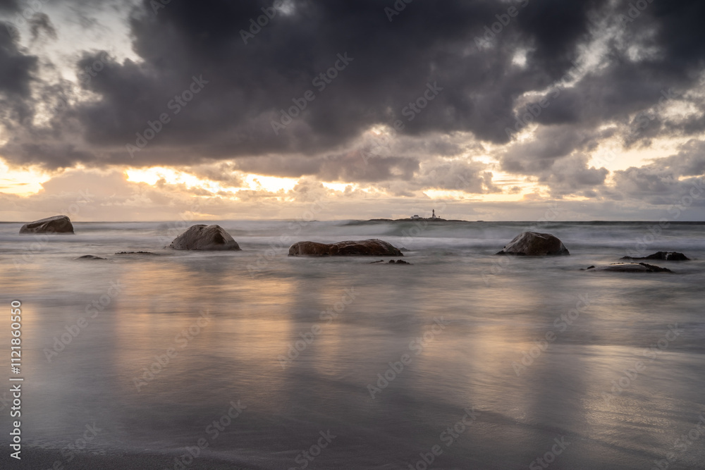 Obraz premium Stunning Sunset at the Coast – Long Exposure Capturing the Smooth Flow of Water and Vibrant Sky Colors, Creating a Peaceful and Serene Seaside Landscape Norway Norge - Jæren, jærstrendene