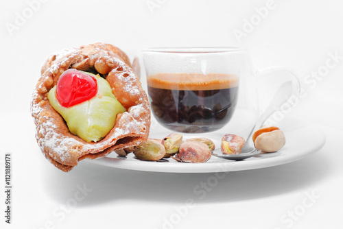 cannolo siciliano al pistacchio e caffè, pistachio sicilian cannolo and coffee photo