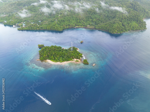 Calm water flows through Lembeh Strait in North Sulawesi. This tropical area is home to a plethora of marine biodiversity and is popular among divers. photo