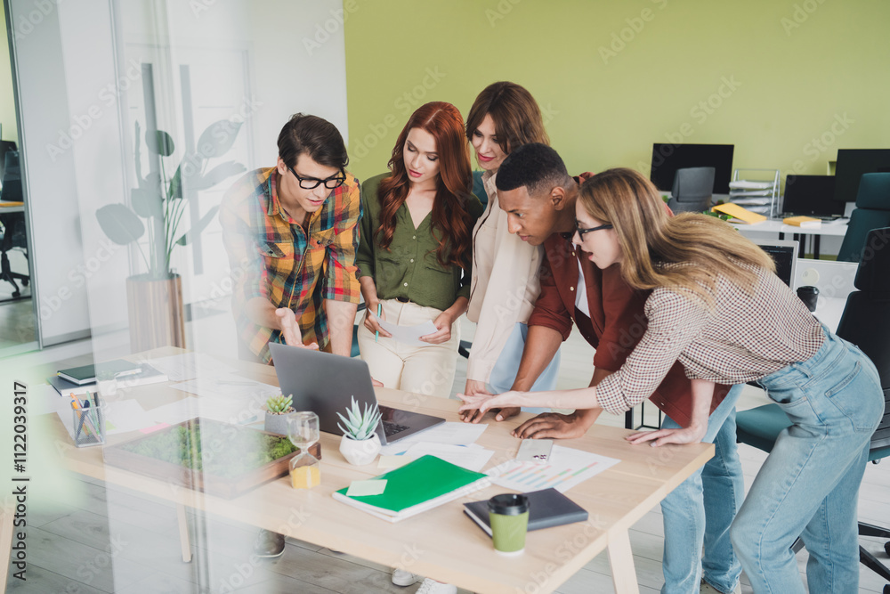 Fototapeta premium Photo of lovely young people teamwork create business strategy startup teambuilding comfortable startup office loft room interior