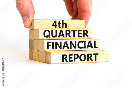 4th quarter financial report symbol. Concept words 4th quarter financial report on beautiful wooden blocks. Beautiful white background. Business 4th quarter financial report concept. Copy space. photo