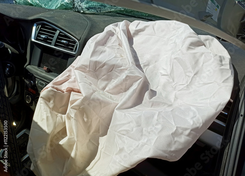 Airbag deployment in a car interior after an accident