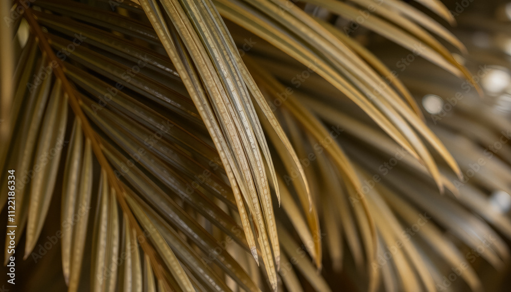 Fototapeta premium lush green palm leaves in a natural tropical environment, enhanced by mocha mousse-inspired tones for a fresh look.