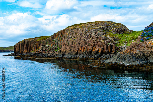 Basalt Cliffs in Breidafjordur Fjord of Iceland.  photo