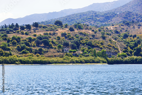 Lake Kournas on Crete and the mountains behind it photo