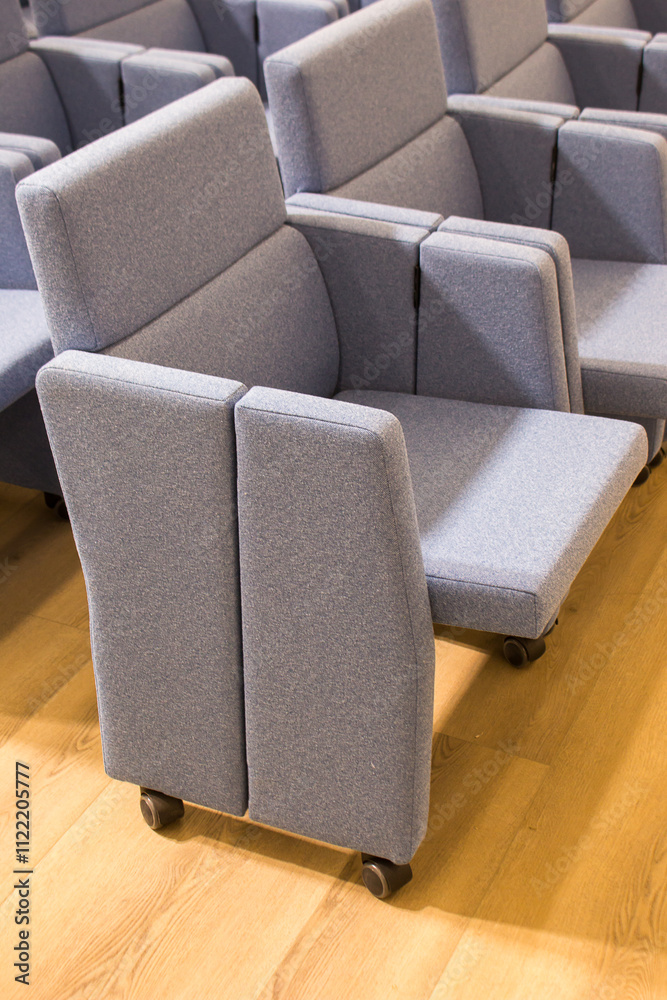 Fototapeta premium chairs for halls, the ability to quickly organize an area for spectators and remove it, adjust the number of seats, their location in the hall