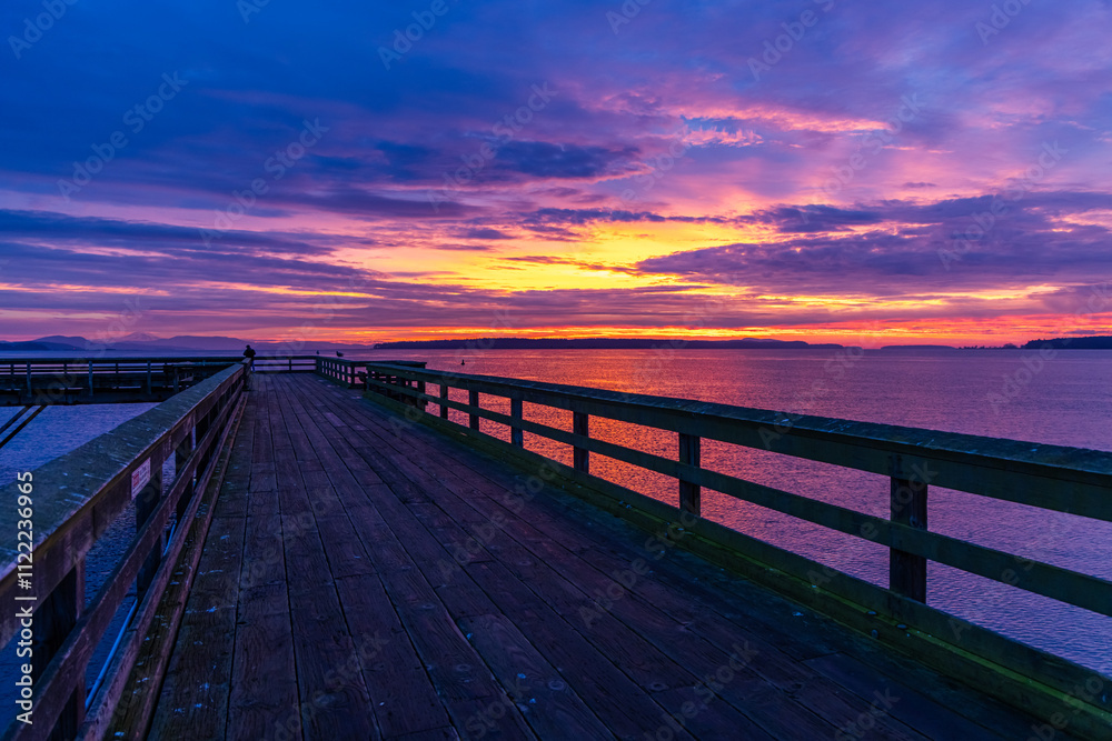 Fototapeta premium Vivid Sunrise Over Pier in Sidney on Vancouver Island, BC, Canada