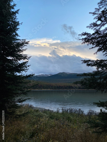 Sunset on the Maligne Lake in the mountains of Jasper, Alberta, Canada.	 photo