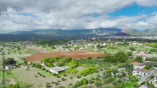 View of Olive groves and fields from a drone over Road E45, Castrovillari, Cosenza, Calabria, Italy, Europe