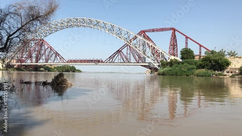 4k footage of Lansdowne Bridge, a 19th-century bridge that spans the Indus River between the cities of Sukkur and Rohri in the Sindh province of Pakistan. The bridge was inaugurated on 25 March 1889. photo