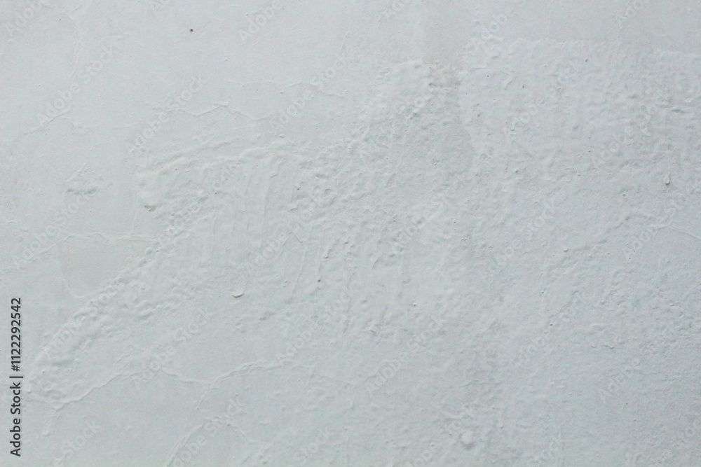 Fototapeta premium Close-up view of a textured light gray surface.