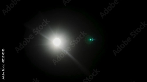 Easy to add lens flare effects for overlay designs or screen blending mode to make high-quality images. Abstract sun burst, digital flare, iridescent glare over black background.