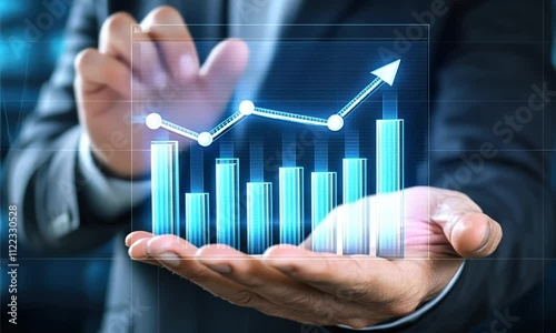 A hand holding a digital representation of bar graphs and a line chart, symbolizing growth and business analytics.
