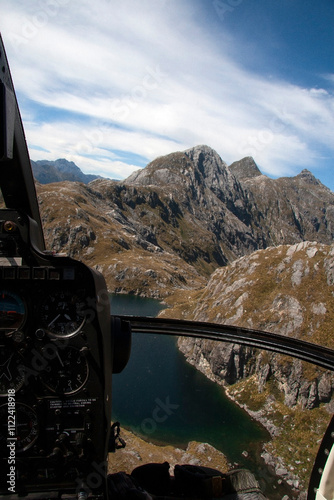 Obraz na plátne Flying in Hughes 500 D Helicopter Fiordland New Zealand