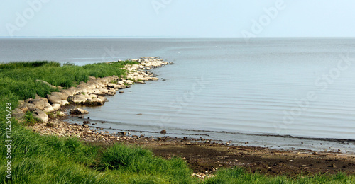 stone spit on Lake Ilmen photo