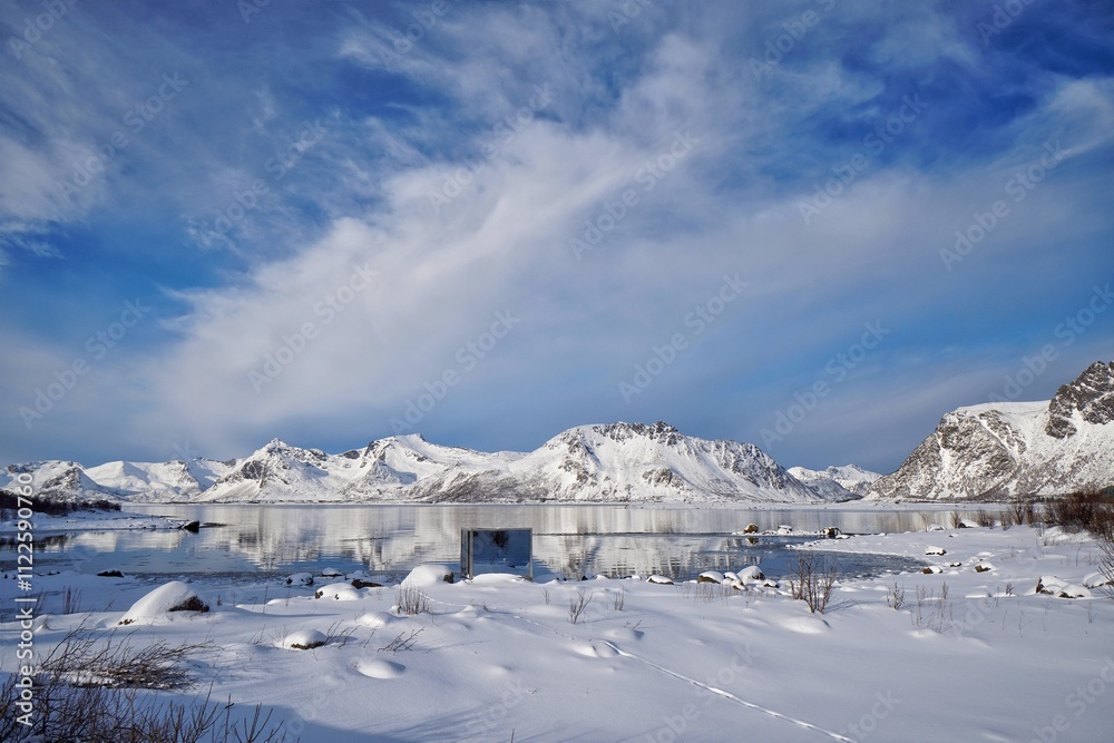 Beautiful lake with snow mountain during winter season.