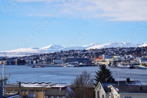 Obraz na płótnie Beautify town with snow mountain background at Norway, Europe. w salonie