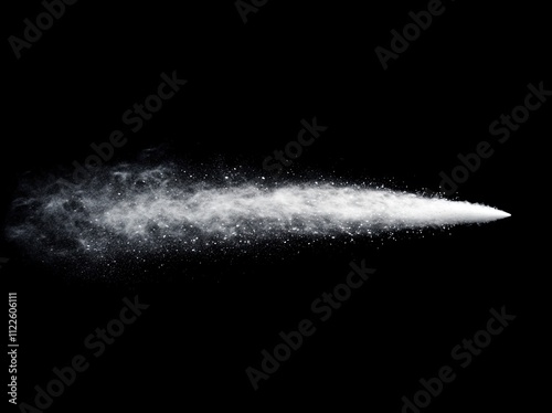 Powerful water jet against black background