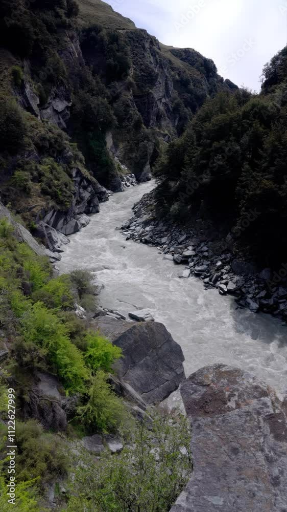 Rugged Landscape Along the Shotover River in Queenstown, New Zealand Rugged Landscape Along the Shotover River in Queenstown, New Zealand