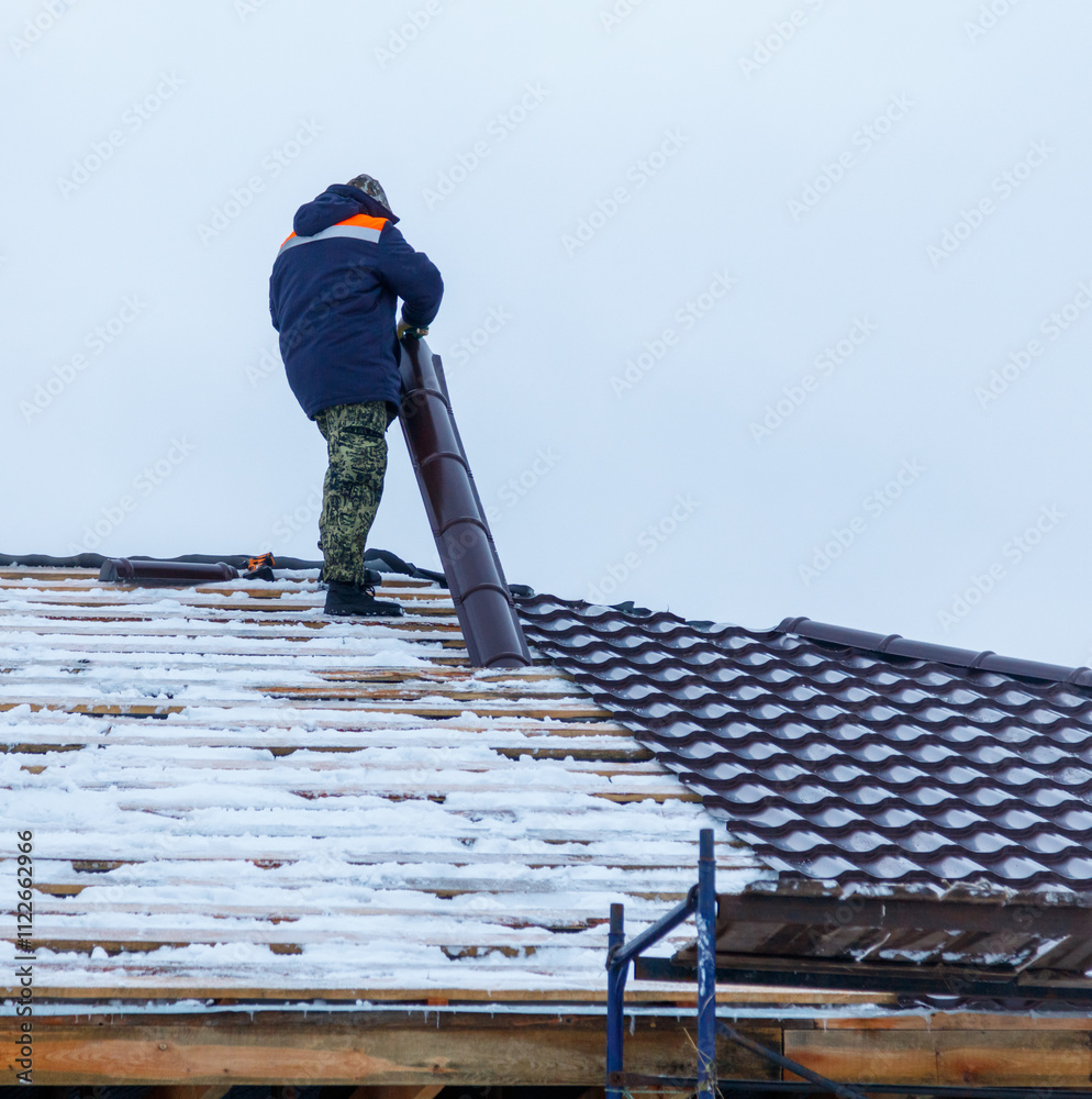 custom made wallpaper toronto digitalA man in a blue jacket is working on a roof