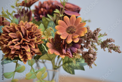 Image of a beautiful bouquet of flowers in a vase taken indoors