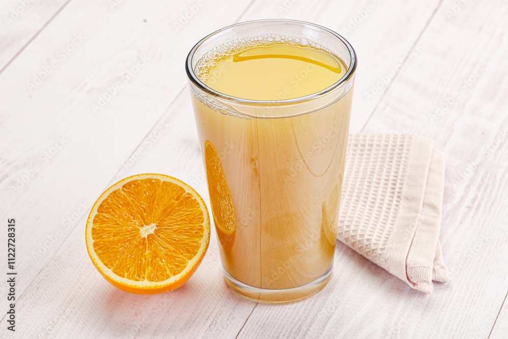 Fototapeta premium Sweet fresh orange juice in the glass