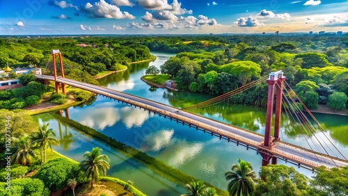 Aerial View of the Stunning Suspension Bridge at Yumka Park in Villahermosa, Tabasco, Mexico Surrounded by Lush Greenery and Serene Waterways in a Beautiful Landscape photo