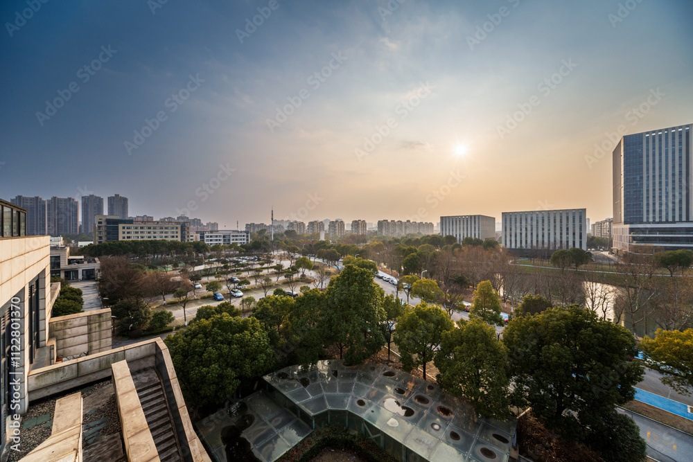 Fototapeta premium Modern Urban Landscape at Sunrise